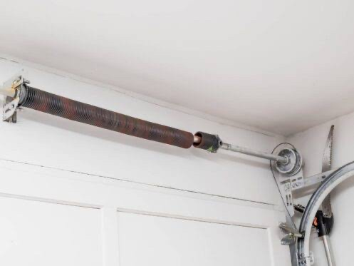 Dallas broken garage door spring repair - torsion spring assembly replacement service